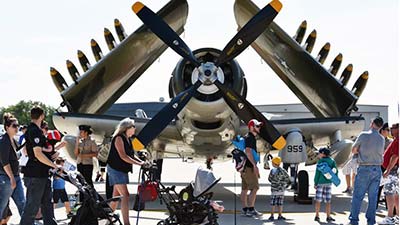 Spectators walk the midway to see aircraft up close on Sept. 7, 2019 at the 2019 Northern Illinois Airshow at the Waukegan National Airport