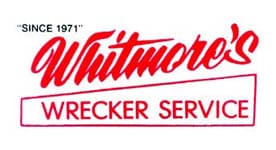 Whitmore's Wrecker Service logo. 